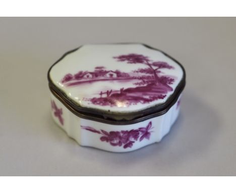Early 19th Century French porcelain oval patch box, enamelled in puce with river scene and floral sprays, 7cm x 6cm x 3cm hig