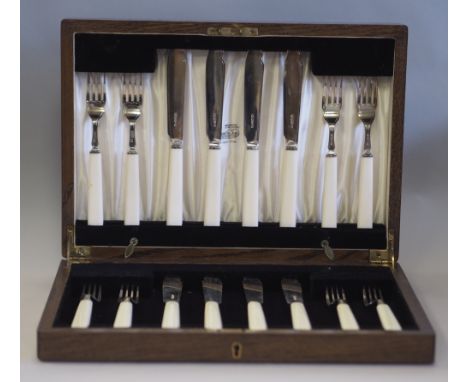 Set of four George V silver and ivorine handled fish forks and four fish knives by Harrison Brothers and Howson, Sheffield, 1