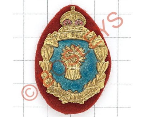 Womens Land Army 10 year service badge.Die-cast gilt crowned laurel wreath with wheatsheaf set on a green enamel ground. Red 