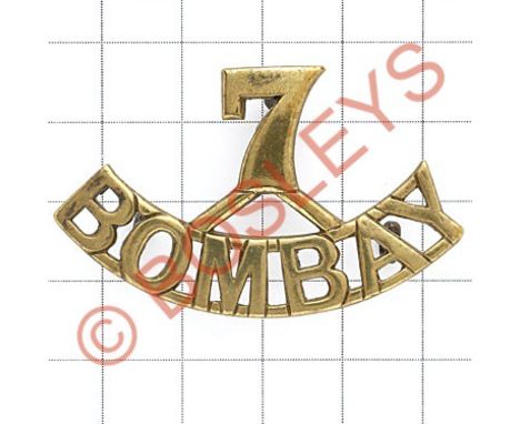 7 / BOMBAY brass pre 1903 Indian Army shoulder title.British made  Three loops Varnished. GC 