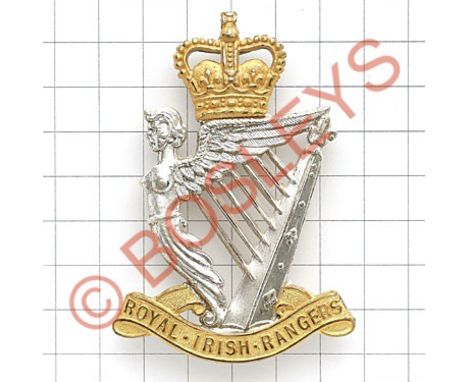 Royal Irish Rangers Piper's badge circa 1968-92.Fine crowned silvered Maid of Erin Harp on gilt 'Royal Irish Rangers' scroll.