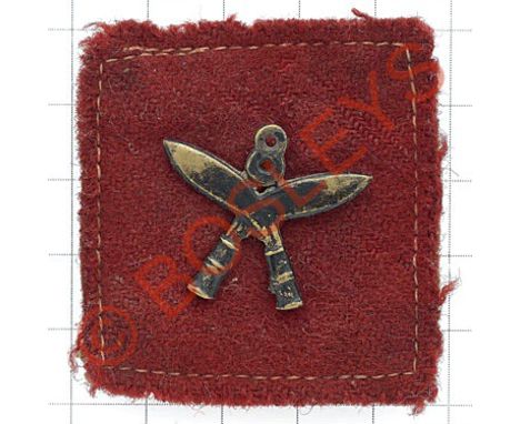 Indian Army. 8th Gurkha Rifles Officer's WW2 period pagri badge.Blackened crossed kukris surmounted by the figure '8' set on 