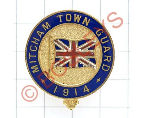Mitcham Town Guard WWI enamelled VTC lapel badgeBlue enamel strap 'Mitcham Town Guard 1914'; Union flag to centre. Reverse wi