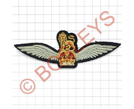1st Glider Pilot cloth WW2 Wings / Army Flying Badge.A good large flat example. Yellow and red Royal Crest flanked by light b