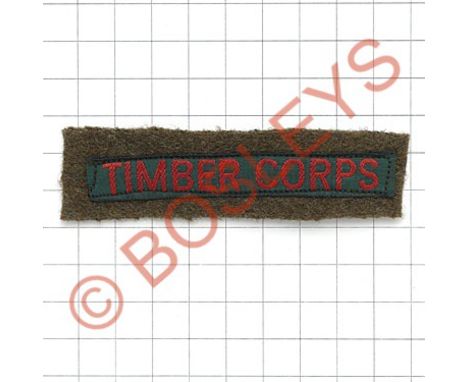 TIMBER CORPS rare Women's Land Army WW2 cloth shoulder title.Red embroidered on green Cash's name tape style  sewn on khaki b