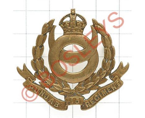 Indian Army. 15th Punjab Regiment post 1922 Officer's gilt cap badge.British made die-cast crowned quoit interlinked with a c