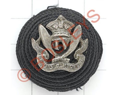 Indian Army. 4th Gurkha Rifles Officer's cord boss and badge.Black cord bearing silvered crowned 'IV' between crossed kukris 