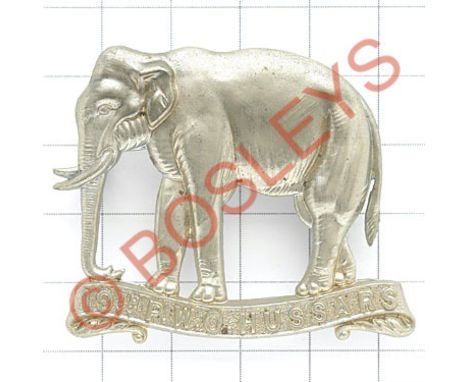 19th Hussars OR's white metal cap badge circa 1898-1902.Die-stamped ''Single scroll elephant''. (KK 789)  Loops (toned black)