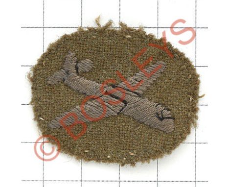 Glider-Borne Troops, Airborne Forces WW2 cloth arm badge.Blue glider embroidered on felt khaki oval.   Removed from uniform. 
