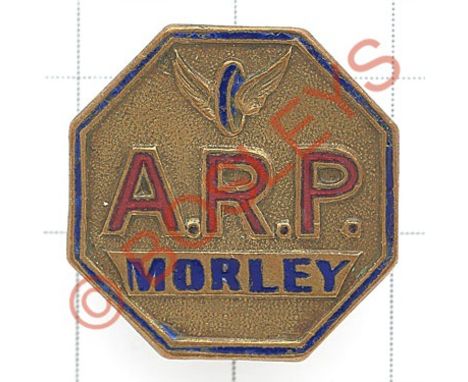 Morley ARP Warden WW2 enamelled lapel badge Octagonal brass with blue and red enamel example bearing winged wheel.   Buttonho