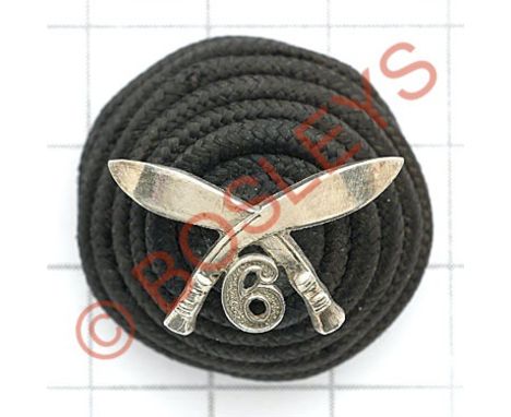 Indian Army. 6th Gurkha Rifles Officer's cord boss and badge circa 1930's-47.Black cord bearing silvered crossed kukris with 
