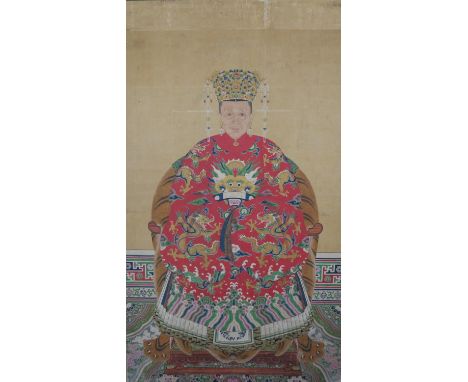 A large framed 19th century Chinese water colour on canvas; ancestor portrait. The figure wearing a robe with four toed drago
