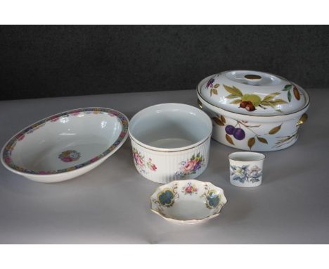 A collection of porcelain. Including a Royal Worcester Evesham design lidded casserole, a Minton serving dish and a collectio