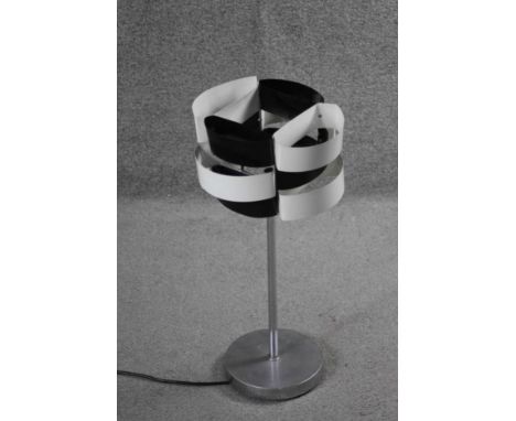 A vintage black and white metal strip abstract design table lamp on brushed chrome stand. H.60 W.27 cm 