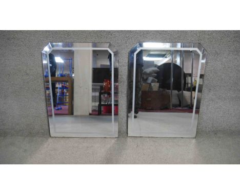 A pair of vintage Art Deco style wall mirrors.
H.70 W.50cm 