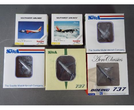 Seattle Model Aircraft Company; Herpa, Aero Classics - A fleet of six boxed diecast model Boeing 737 aircraft in 1:400 scale.