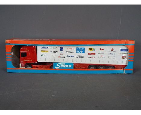 Tekno - A boxed Tekno #78 diecast 1:50 scale DAF 95XF Curtainside from 'The British Collection'. The model with red cab and c