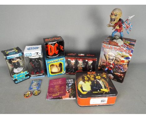 Funko, NECA, Others - A mixed collection of action figures and collectables. Lot includes a Funko 'Family Guy Blue Harvest Bo