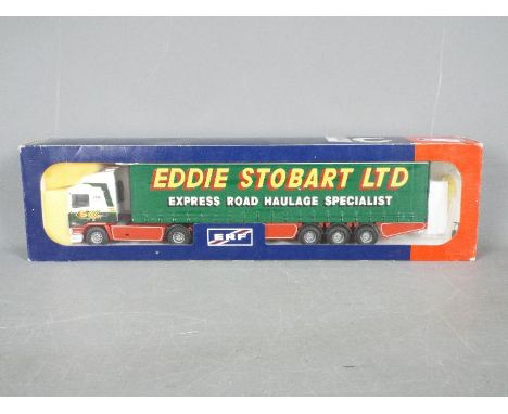 Tekno - A boxed Tekno #50 diecast 1:50 scale ERF Curtainside 'Eddie Stobart' from 'The British Collection'. The model in red,