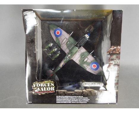 Forces of Valor - A boxed 1:32 scale Forces of Valor #86000 Spitfire MK.IX no.132 Wing - The Netherlands 1945. The model appe