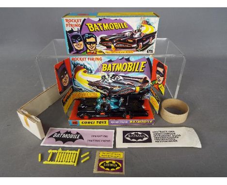 Corgi Toys - A boxed Corgi Toys 1st issue #267 Batmobile. The model with gloss black body, orange 'Bat' logo on doors, with g