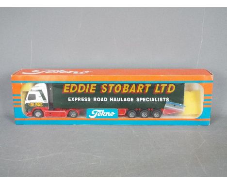 Tekno - A boxed Tekno diecast 1:50 scale #69 Volvo FH12 'Eddie Stobart' from 'The British Collection'. The model in red, whit