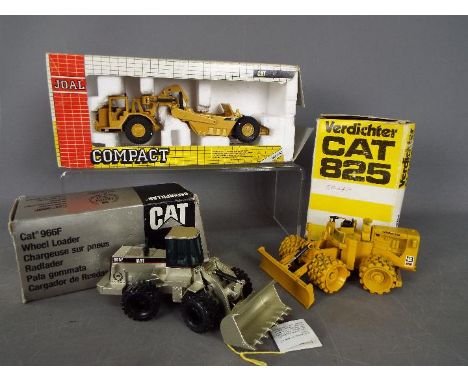 Joal, NZG - Three boxed diecast construction vehicles in 1:50 scale. Lot includes NZG #135 CAT 825 Compactor; Joal #219 CAT 6