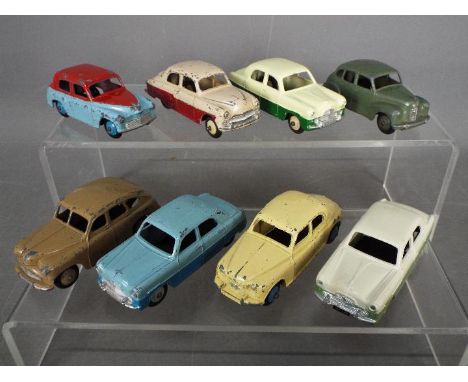 Dinky Toys - A collection of 8 unboxed diecast Dinky Toys. Lot includes Dinky Toys #154 Hillman Minx (light blue lower body, 