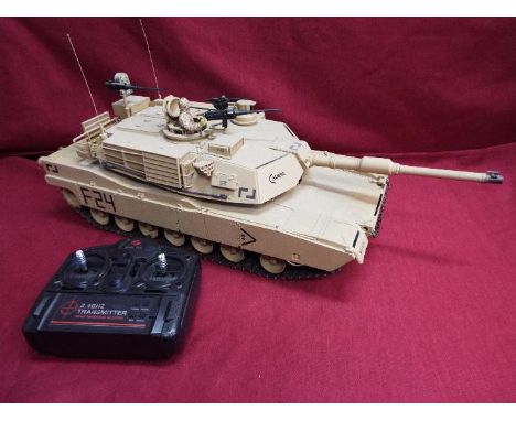 Heng Long - Abrams 1/16 scale M1A2 tank with 2.4 GHz transmitter. This version has metal tracks and chains. Fires an invisibl