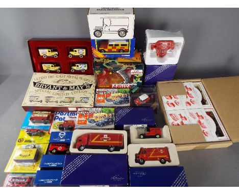 Lledo, Matchbox, Ertl, Galoob, Other - A collection of approximately 20 diecast model vehicles in a range of scales. Lot incl