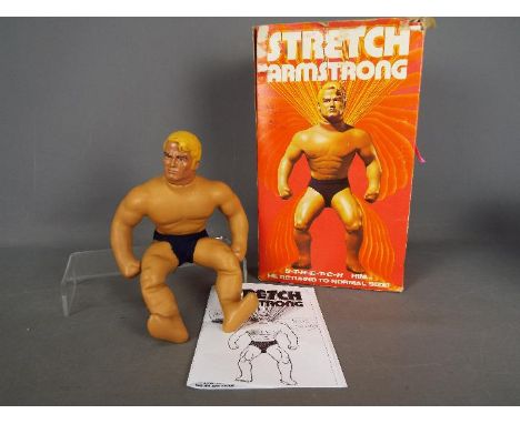 Denys Fisher - A vintage boxed 'Stretch Armstrong' by Denys Fisher. The figure appears to be in pliable condition with a few 