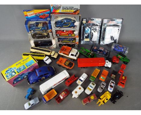 Matchbox, Guisval, Corgi, Herpa, Others - A mixed collection of boxed and unboxed diecast and plastic vehicles in a variety o