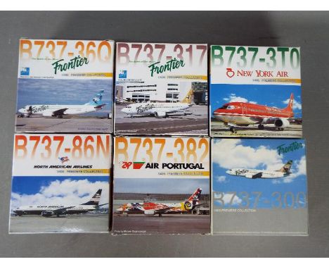 Dragon Wings - Six boxed diecast model aircraft in 1:400 scale from the Dragon Wings 'Premiere Collection'. Lot includes Drag