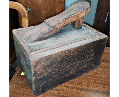 A vintage wooden cased shoe shine foot rest 