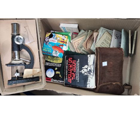 A boxed student's microscope and a selection of snapshot albums, vintage cameras etc and a vintage microscope 