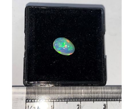 A cabochon cut opal, .95 carat 
