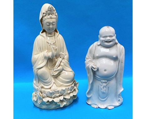 A Chinese Blanc de Chine figure of a seated Buddha ht. 26cm seal mark to back and a similar Buddha (a.f).&nbsp;Guan Yin figur