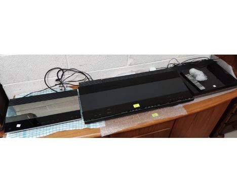 A Bang & Olufsen stereo system Beocentre 8000 tuner amp, Bocord 4500 CD player , Bogram R x 2 record decks and twin speakers 