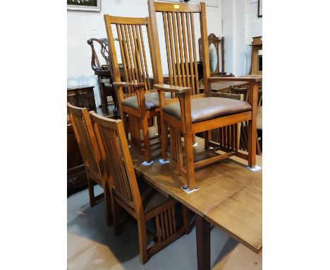 A set of 6 (4 + 2) stripped dining chairs after Frank Lloyd Wright, with stick backs and sides 