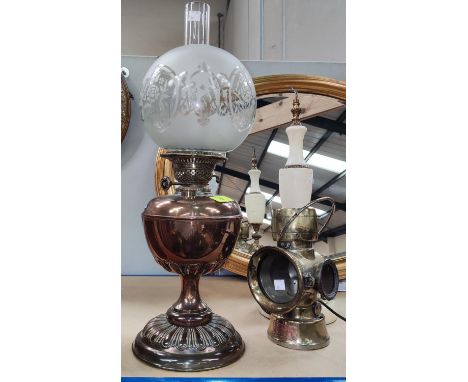 A copper oil lamp with etched shade and&nbsp; "King Road" brass road lamp and an alabaster table lamp 