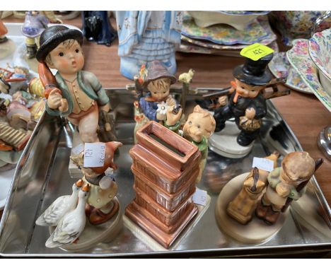 7 Goebel Hummel figures including Little Thrifty , Goose Girl etc.&nbsp;Boy with fence has been re glued, boy walking with a 