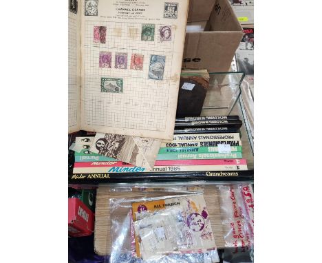 A vintage collection of stamps, various Sweeney and Professionals annuals 