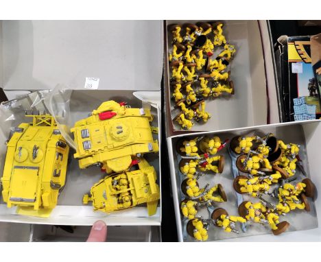 A selection of early to late 1990's vintage Games Workshop Warhammer 40,000 Space Marine medals and vehicles, 20 Tactical mar