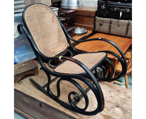 A vintage ebonised bentwood rocking chair (with repair) 