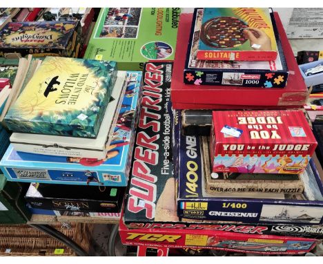 A vintage casino boxed Bells delux; a boxed super striker game TRC racing system + other boxed games. 