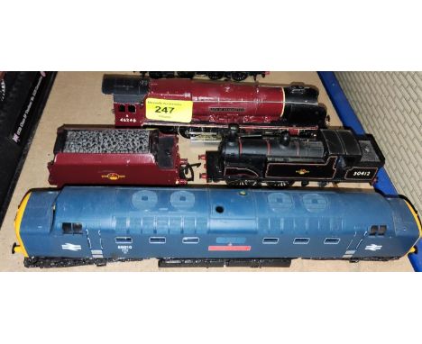 A Hornby 00-gauge unboxed City of Manchester maroon livery loco, another similar in black and a Lima train 