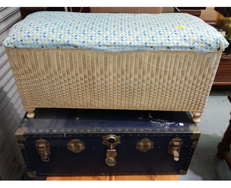 A cream Loyd Loom Ottoman &amp; chair in cream; a cabin trunk. 
