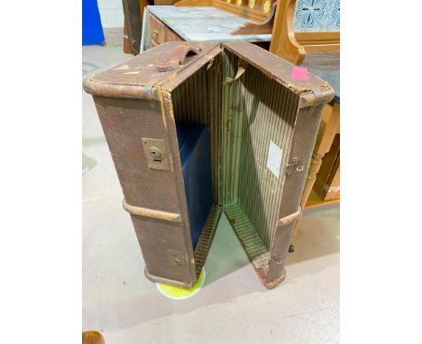A vintage travel trunk and two vintage suitcases 