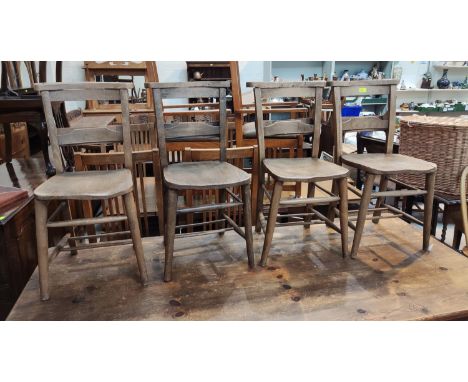 A set of late 19th/early 20th century chapel chairs in stripped pine with bible shelf to back 