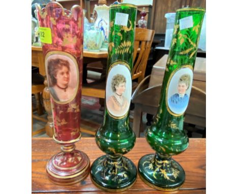 A pair of 19th century green overlaid glass vases with bust portrait cameos and a similar pink vasered vase height 31.5cm,gre